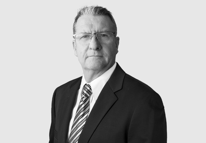 A headshot image of John Gow