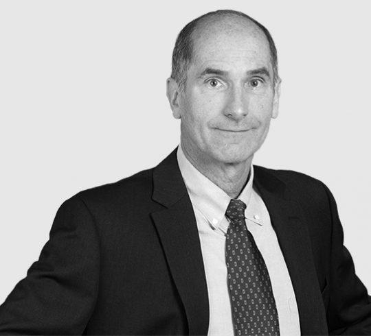 A headshot image of Dan V. Joyce